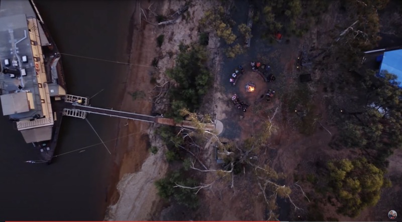 PS Emmylou drone shot showing passengers around a firepit